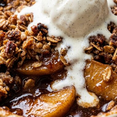 Ultra close-up macro of baked old-fashioned warm cinnamon apple crisp